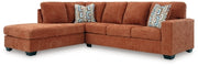 Ashley Furniture Aviemore sectional with chaise, featuring plush fabric upholstery and modern design in a spacious living room setting.