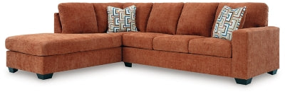 Ashley Furniture Aviemore sectional with chaise, featuring plush fabric upholstery and modern design in a spacious living room setting.
