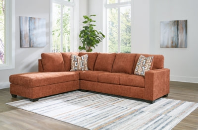 Ashley Furniture Aviemore sectional with chaise, featuring plush fabric and modern design for comfortable living room seating.