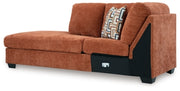 Ashley Furniture Aviemore sectional with chaise, showing a modern fabric sofa with plush cushions and a spacious seating arrangement.