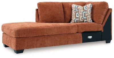 Ashley Furniture Aviemore sectional with chaise, showing plush fabric upholstery and modern design from an angled view.