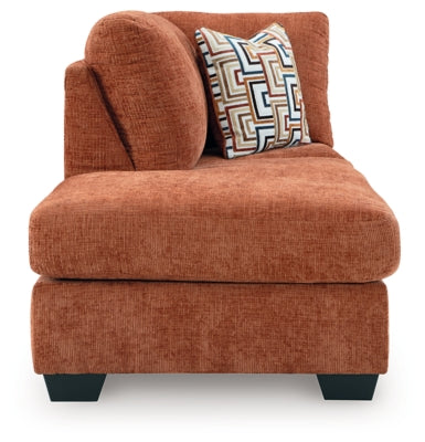 Ashley Furniture Aviemore sectional with chaise, shown head-on view, featuring plush cushions and modern design.