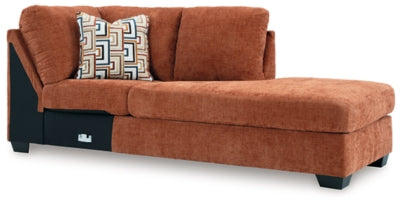 Ashley Furniture Aviemore sectional with chaise, showcasing a modern upholstered sectional sofa in a stylish living room setting.