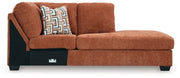 Ashley Furniture Aviemore sectional with chaise, showing plush upholstered fabric and modern design with ample seating.