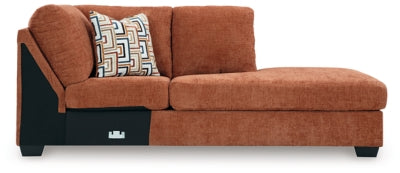 Ashley Furniture Aviemore sectional with chaise, showing plush upholstered fabric and modern design with ample seating.