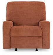 Ashley Furniture Aviemore recliner in tan fabric, showing plush cushioning and wooden legs from a front head-on view.
