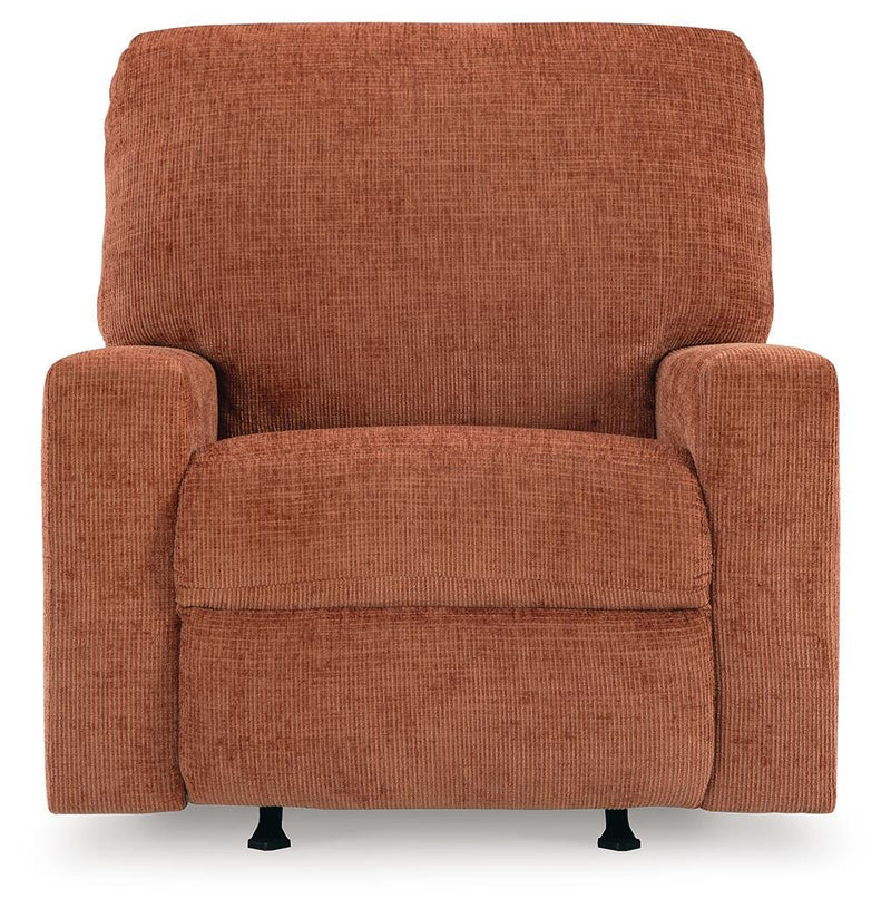 Ashley Furniture Aviemore recliner in tan fabric, showing plush cushioning and wooden legs from a front head-on view.