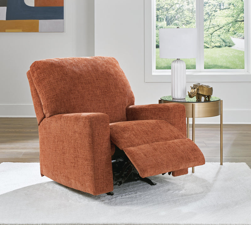 Open Ashley Furniture Aviemore recliner in warm brown upholstery showing plush cushioning and ergonomic design.