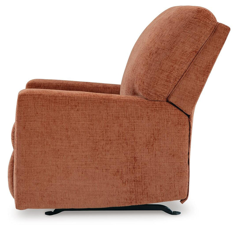Ashley Furniture Aviemore recliner with plush upholstery and padded armrests, shown from the side view.