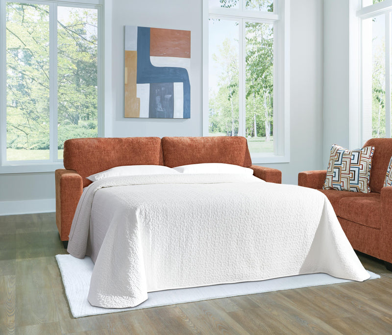 Ashley Furniture Aviemore Sofa Sleeper with plush fabric and fold-out mattress, showcasing a stylish and functional living room piece.