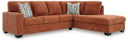 Ashley Furniture Aviemore sectional with chaise, featuring plush upholstery and modern design in a spacious living room setting.