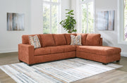 Ashley Furniture Aviemore sectional with chaise, featuring plush upholstered cushions and modern design in a cozy living room setting.
