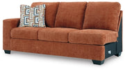 Ashley Furniture Aviemore sectional with chaise, showing a modern fabric sofa with plush cushions and a spacious lounge area.