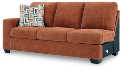 Ashley Furniture Aviemore sectional with chaise, showing a modern fabric sofa with plush cushions and a spacious lounge area.