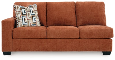 Ashley Furniture Aviemore sectional with chaise, featuring plush cushions and fabric upholstery, shown from a head-on angle.