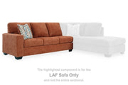 Ashley Furniture Aviemore sectional with chaise, featuring plush fabric and modern design, shown in a spacious living room setting.