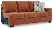 Ashley Furniture Aviemore sectional with chaise, showing a modern L-shaped sofa with plush cushions and contemporary design.