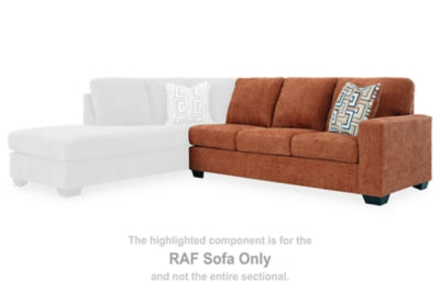 Ashley Furniture Aviemore sectional with chaise, featuring plush cushions and modern design, in a cozy living room setting.