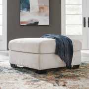 Aviemore oversized accent ottoman by Ashley Furniture with plush upholstered fabric and a sturdy wooden base.