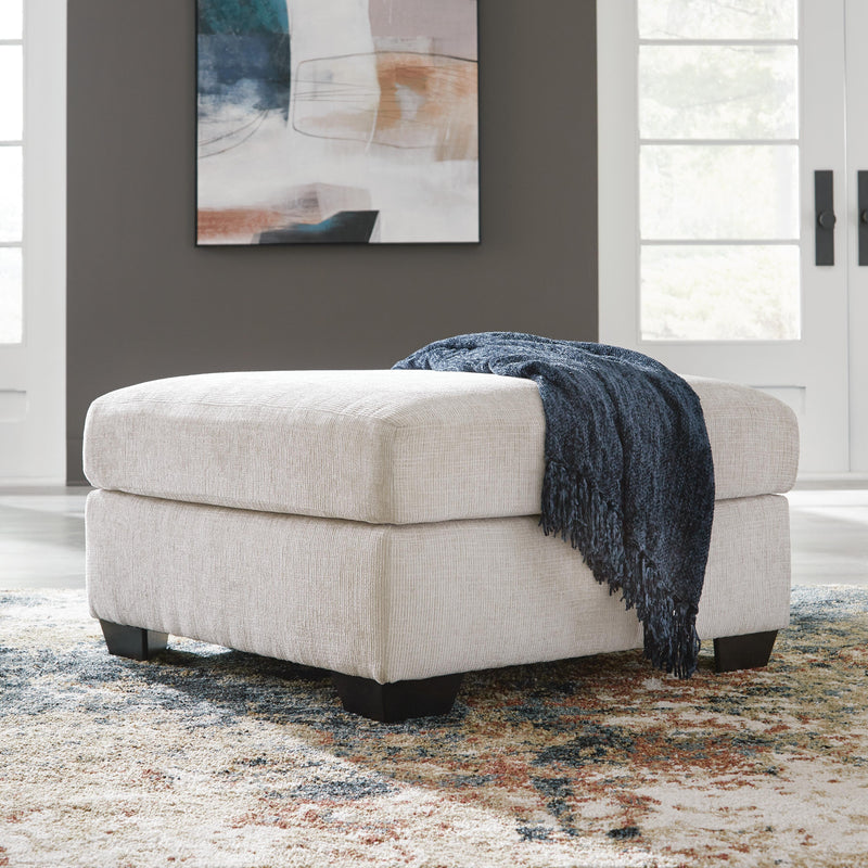 Aviemore oversized accent ottoman by Ashley Furniture with plush upholstered fabric and a sturdy wooden base.