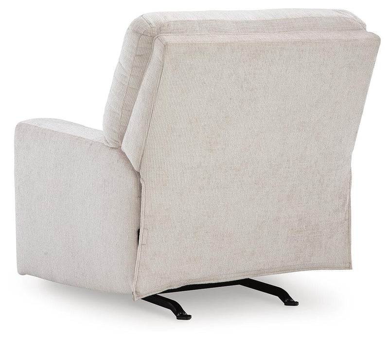 Ashley Furniture Aviemore Recliner with plush fabric and padded armrests, shown in a cozy living room setting.