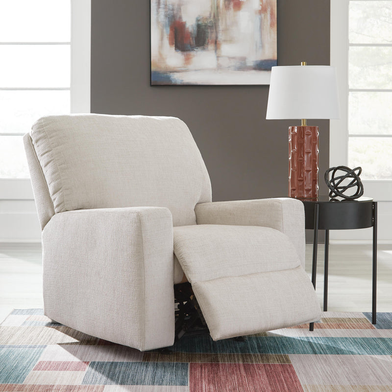 Open Ashley Furniture Aviemore Recliner showing plush fabric upholstery and padded armrests in a cozy living room setting.