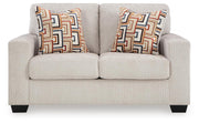 Ashley Furniture Aviemore loveseat with plush upholstery, two cushions, and wooden legs, shown from a head-on angle.