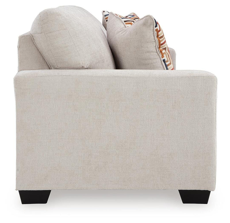 Ashley Furniture Aviemore Sofa Sleeper with plush fabric, side view showing the convertible sofa bed and modern design.