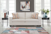 Ashley Furniture Aviemore Sofa Sleeper with plush fabric, featuring a fold-out bed and modern design in a neutral color.
