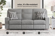 Ashley Furniture Biscoe living room set with plush fabric sofa and armchair, modern design, and wooden legs in a stylish living room setting.