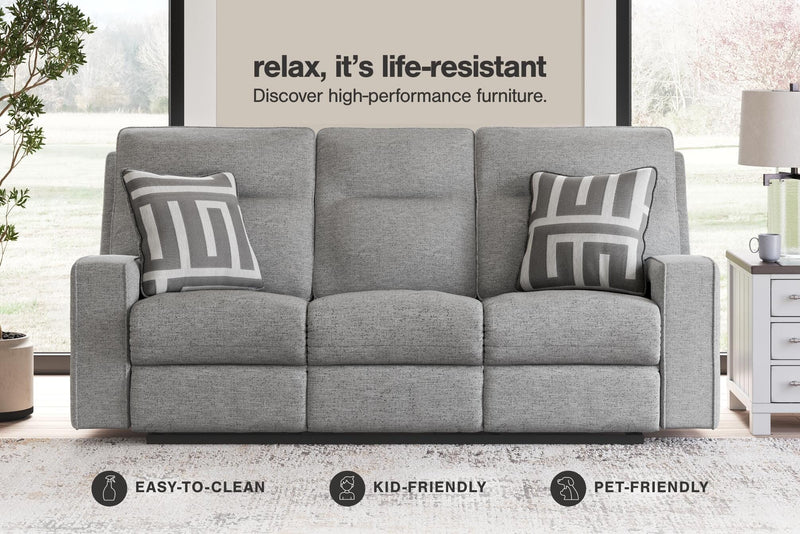Ashley Furniture Biscoe living room set with plush fabric sofa and armchair, modern design, and wooden legs in a stylish living room setting.