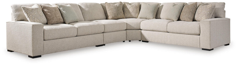 Ashley Furniture Ballyton upholstery living room set with sofa and armchair in neutral fabric, detailed close-up of fabric texture.