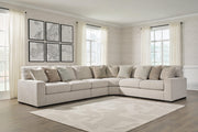 Ashley Furniture Ballyton upholstery package for living room set, includes sofa and armchair in neutral fabric.