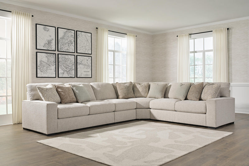 Ashley Furniture Ballyton upholstery package for living room set, includes sofa and armchair in neutral fabric.