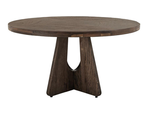 Round dining table with a natural wood finish, model Balam 47 from International Furniture Direct, set with chairs in a modern dining room setting.
