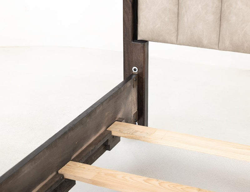 Eastern King upholstered bed in Mezquite II finish by International Furniture Direct, featuring a stylish headboard and sturdy frame.