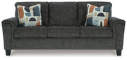 Ashley Furniture Erinslane sofa with plush cushions and neutral fabric, shown from the front in a head-on view.