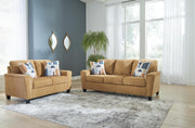 Ashley Furniture Erinslane living room set featuring a sofa and loveseat with neutral upholstery and wooden legs.