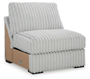 Ashley Furniture Stupendous Sectional sofa shown from an angled view with plush cushions and modern design.