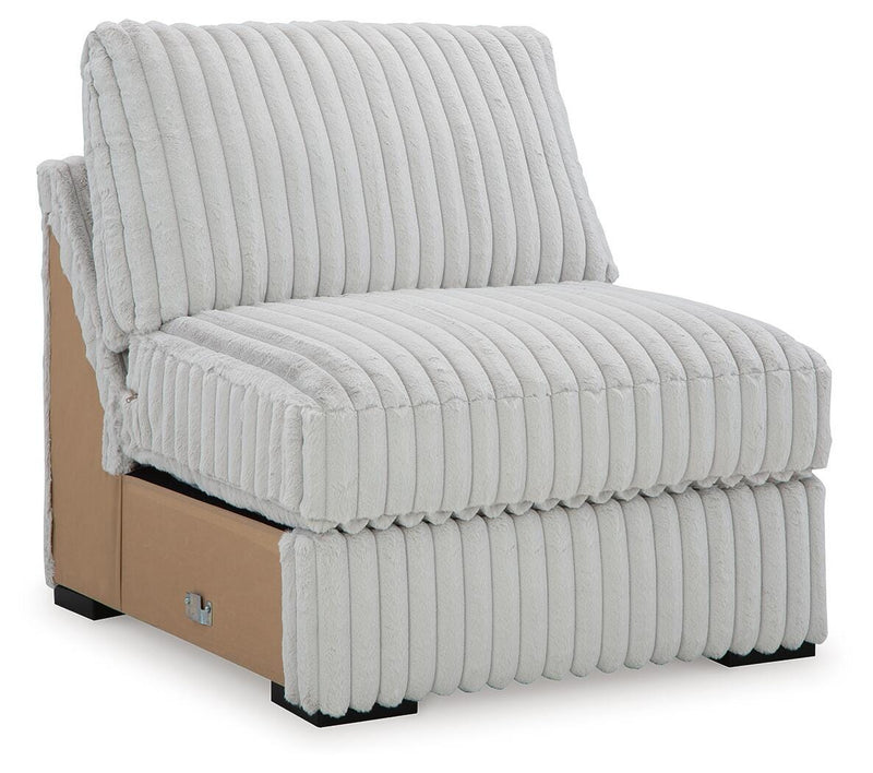 Ashley Furniture Stupendous Sectional sofa shown from an angled view with plush cushions and modern design.