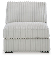 Ashley Furniture Stupendous sectional sofa with plush cushions and neutral fabric, shown from a head-on perspective.