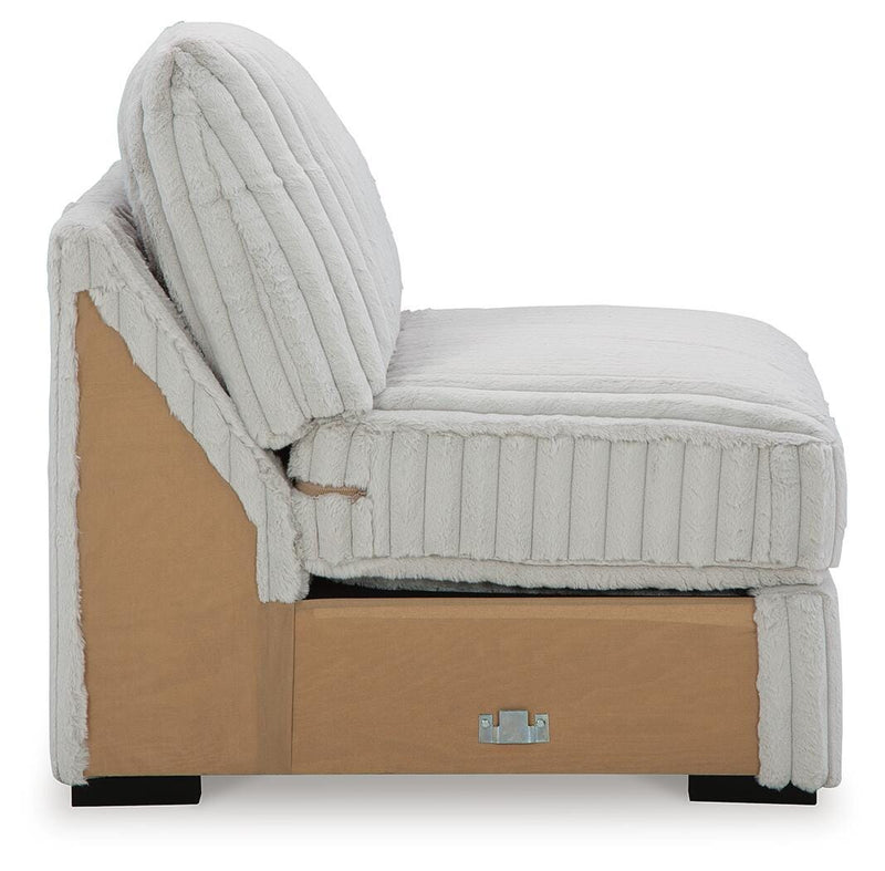 Ashley Furniture Stupendous Sectional sofa with plush cushions and a modern design, shown in a cozy living room setting.
