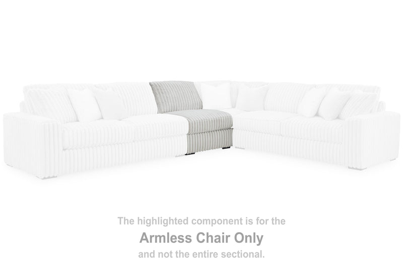 Ashley Furniture Stupendous Sectional sofa with plush cushions and modern design, shown in a cozy living room setting.