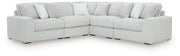 Ashley Furniture Stupendous sectional with plush fabric, featuring a modern L-shaped design and multiple cushions for comfort.