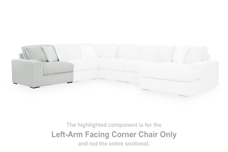 Ashley Furniture Stupendous Sectional sofa with plush cushions and modern design, shown in a spacious living room setting.