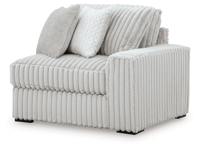 Ashley Furniture Stupendous sectional sofa shown from an angled view, featuring plush cushions and modern design.