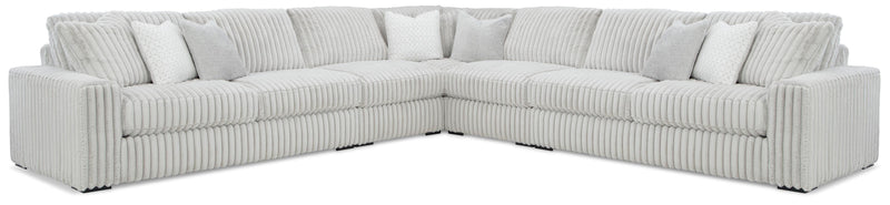 Ashley Furniture Stupendous Sectional showing plush fabric cushions and modern sectional design in a cozy living room setting