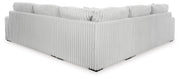 Ashley Furniture Stupendous living room set featuring plush sofas and coordinated chairs in a modern design, back view.
