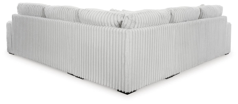 Ashley Furniture Stupendous living room set featuring plush sofas and coordinated chairs in a modern design, back view.