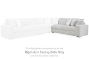 Ashley Furniture Stupendous Sectional sofa with plush cushions and modern design, shown in a cozy living room setting.